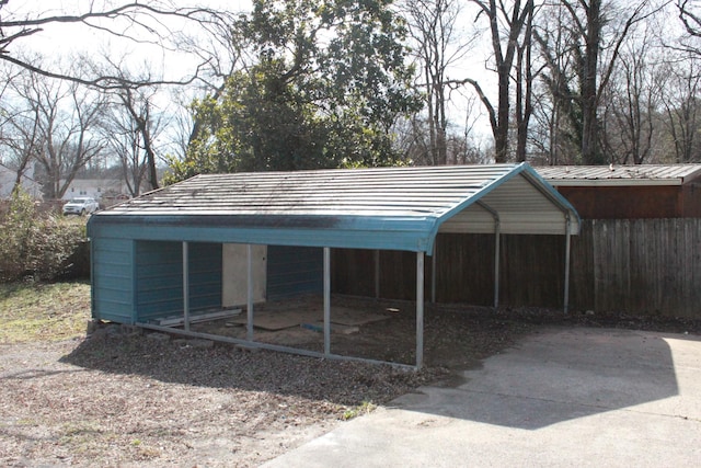 garage featuring a carport