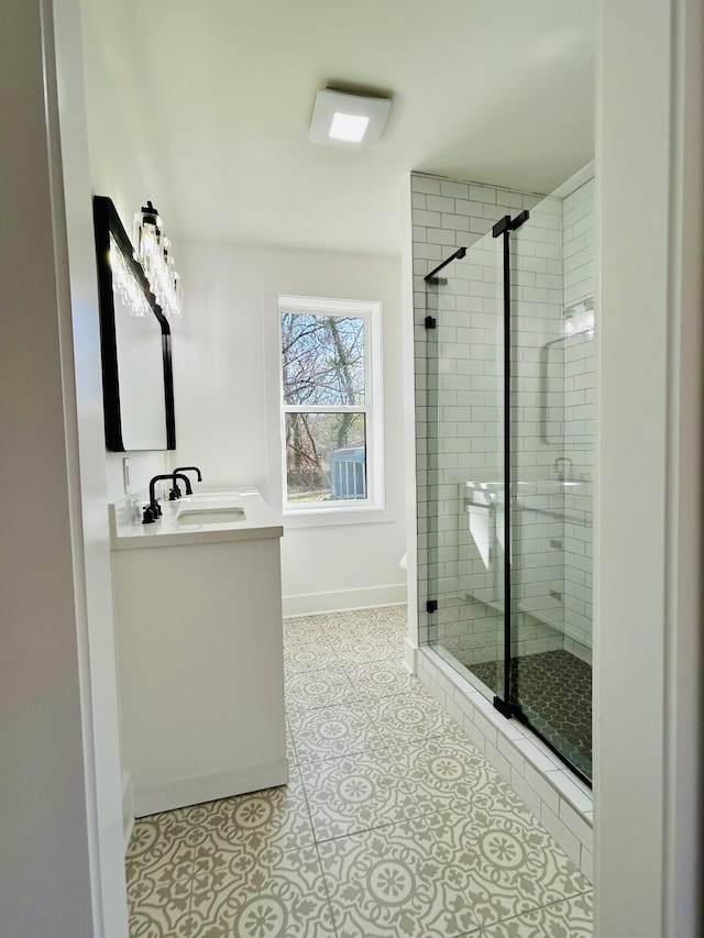 bathroom with vanity and walk in shower