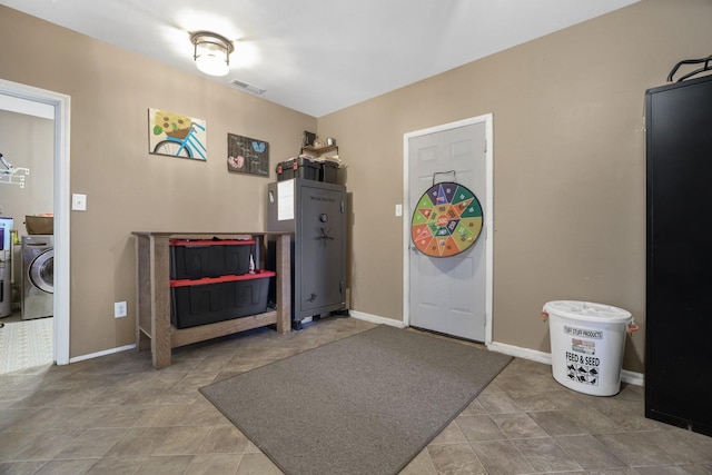 interior space with washer / clothes dryer