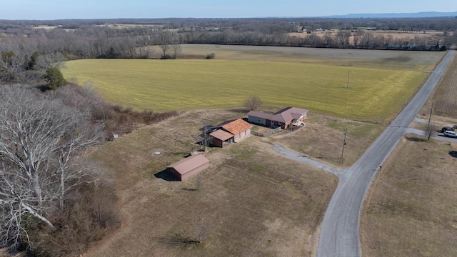 birds eye view of property featuring a rural view