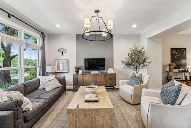 living room featuring a chandelier