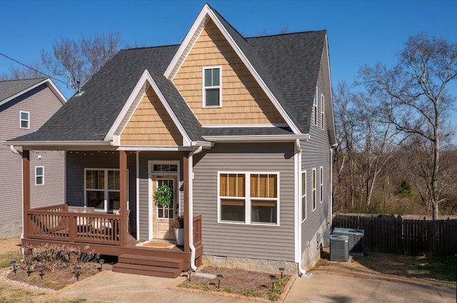 view of front of property with central AC and a porch