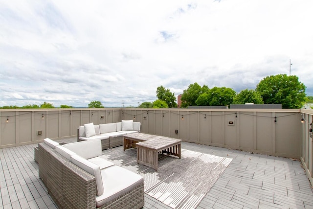 wooden deck featuring an outdoor living space