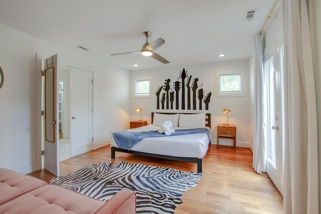 bedroom featuring ceiling fan and light wood-type flooring