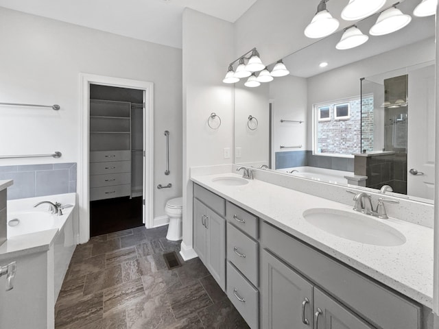 full bathroom with toilet, vanity, and plus walk in shower