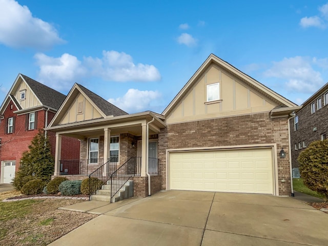 view of front of home featuring a garage and covered porch