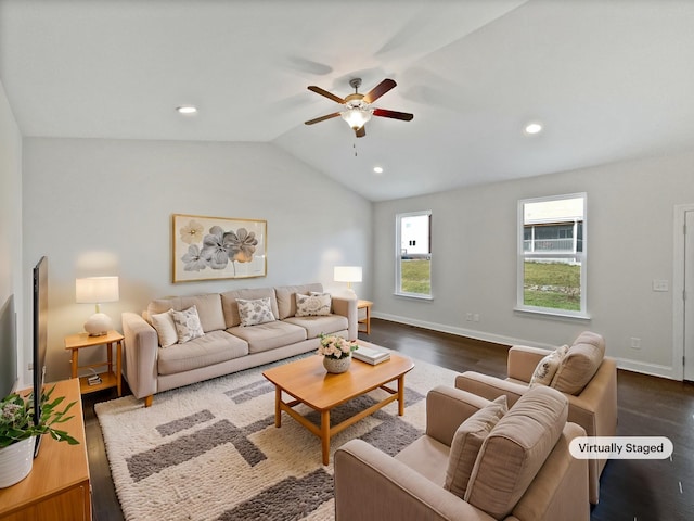 living room featuring dark hardwood / wood-style flooring, vaulted ceiling, and ceiling fan