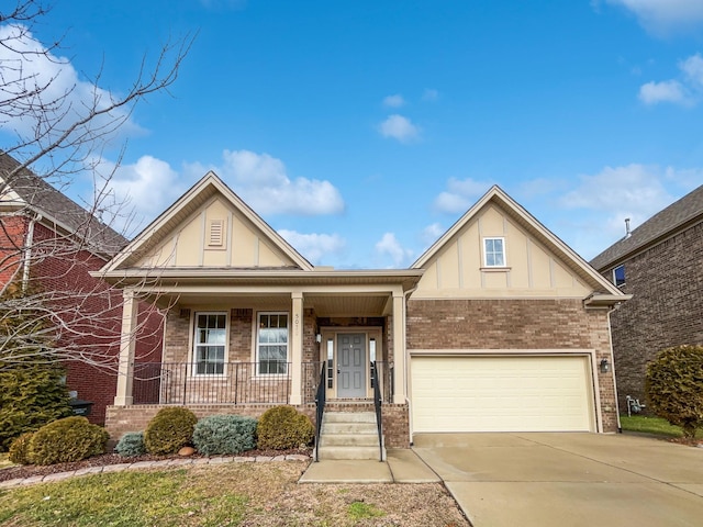 view of front of house featuring a garage and covered porch