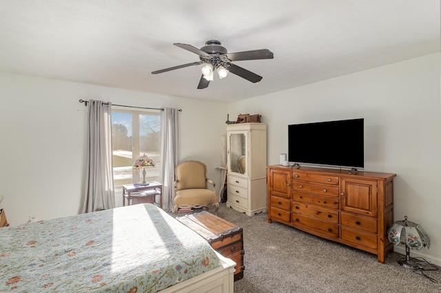 bedroom featuring ceiling fan and light colored carpet