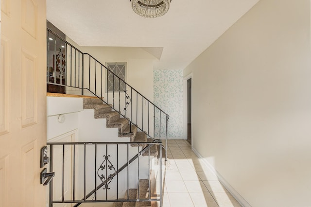 stairway featuring tile patterned floors