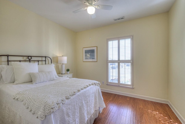 bedroom featuring hardwood / wood-style floors and ceiling fan