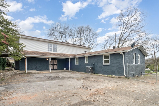 front of property with central AC unit