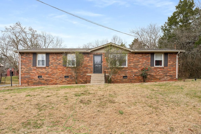 ranch-style home with a front lawn