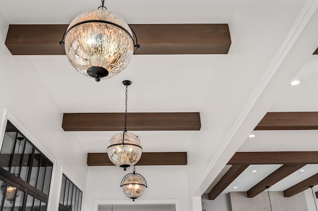 interior details with beamed ceiling and an inviting chandelier