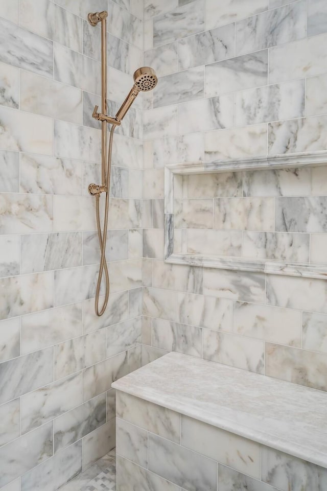 room details featuring tiled shower