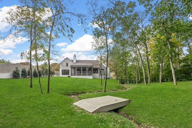 view of community with a yard