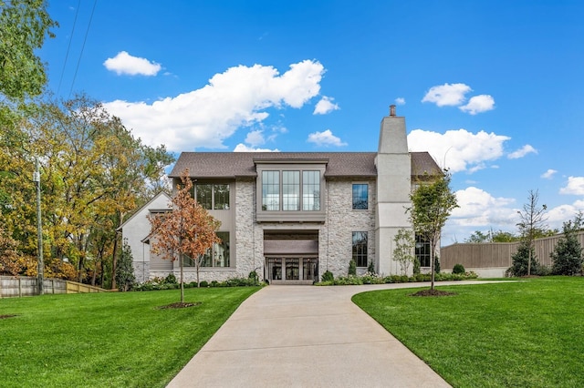 view of front of property with a front lawn