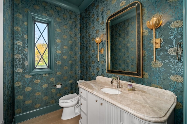 bathroom featuring vanity, toilet, and hardwood / wood-style floors