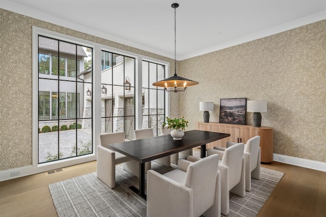 dining area featuring wood-type flooring