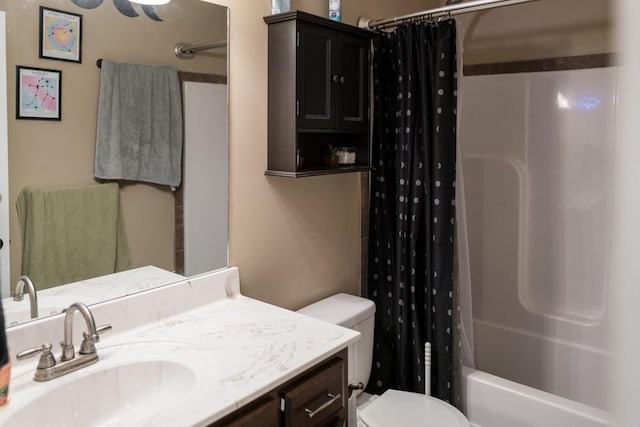 full bathroom with vanity, toilet, and shower / bath combo