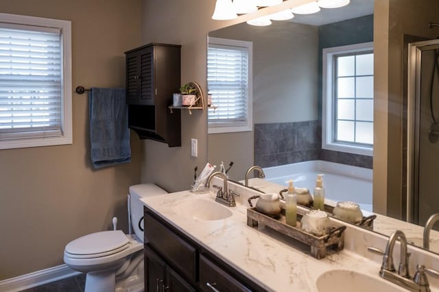 full bathroom featuring toilet, tile patterned floors, vanity, and shower with separate bathtub