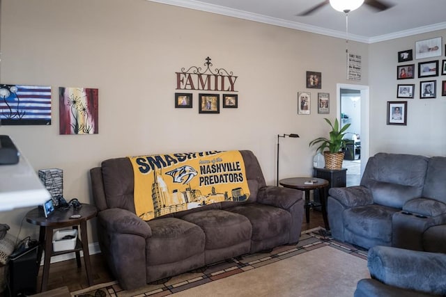 living room with crown molding and ceiling fan