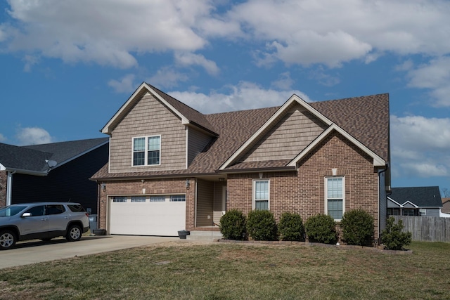 view of front facade featuring a garage and a front lawn