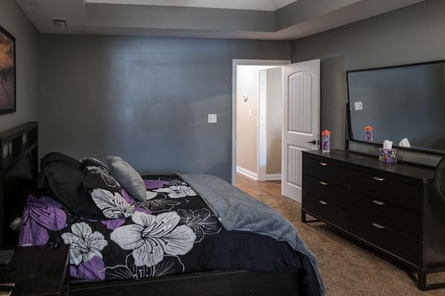 bedroom featuring carpet