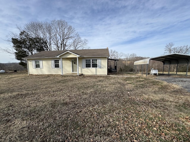 ranch-style home with a carport