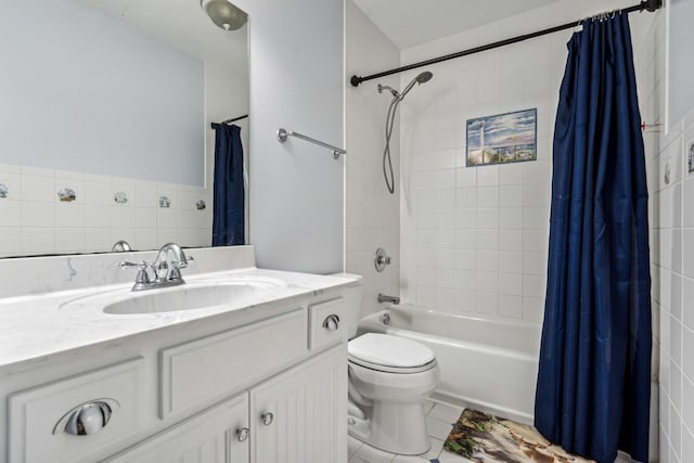 full bathroom with vanity, shower / bath combo, tile patterned floors, and toilet