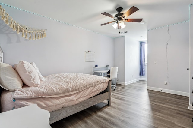 bedroom with hardwood / wood-style floors and ceiling fan