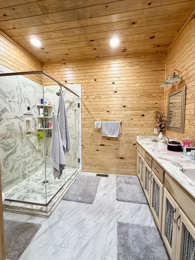 bathroom featuring a marble finish shower, double vanity, recessed lighting, wood ceiling, and wooden walls