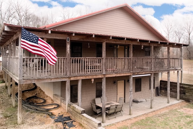 back of property with a patio area