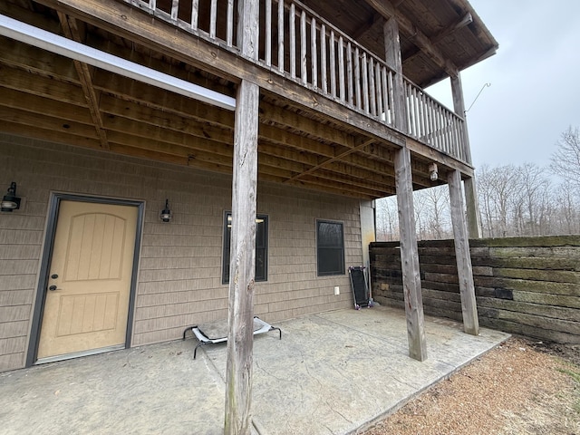 view of patio featuring fence