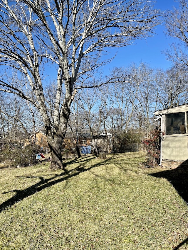 view of yard featuring a sunroom