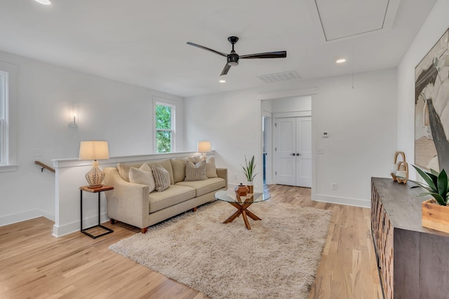 living room with light hardwood / wood-style flooring