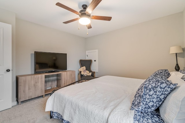 bedroom with light carpet and ceiling fan