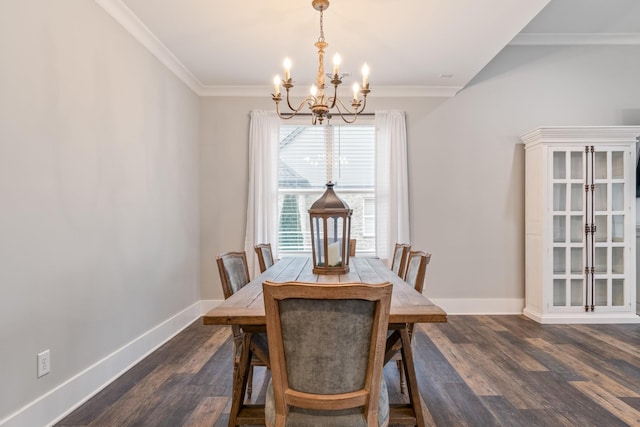 dining room featuring ornamental molding, dark hardwood / wood-style floors, and a chandelier