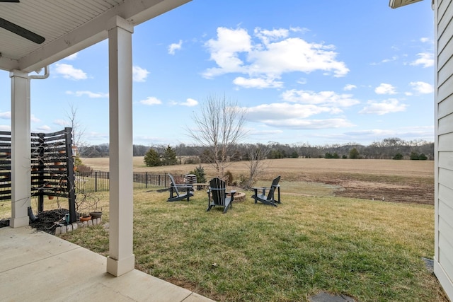 view of yard featuring a patio and a rural view