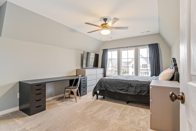 carpeted bedroom with lofted ceiling and ceiling fan