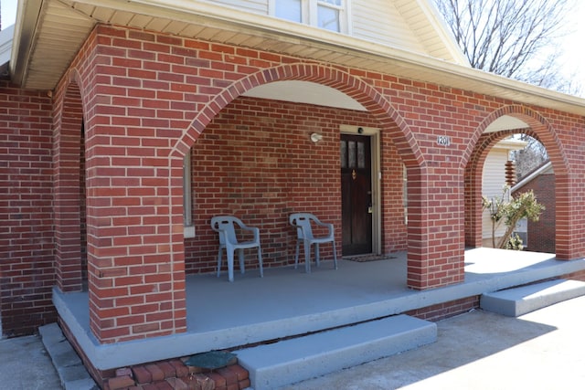 view of patio featuring a porch