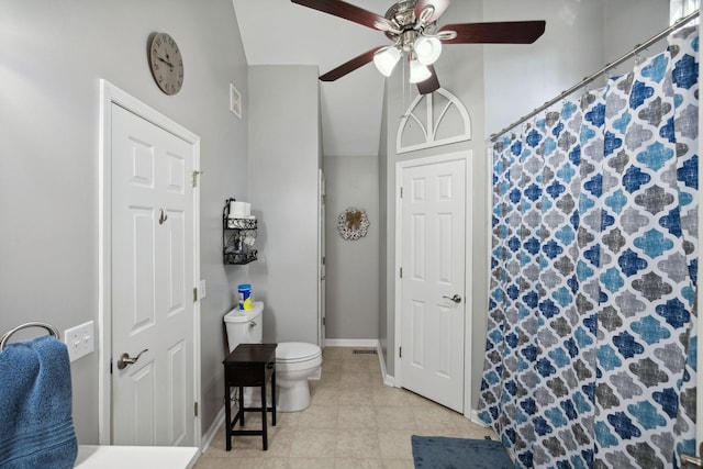 bathroom featuring ceiling fan and toilet