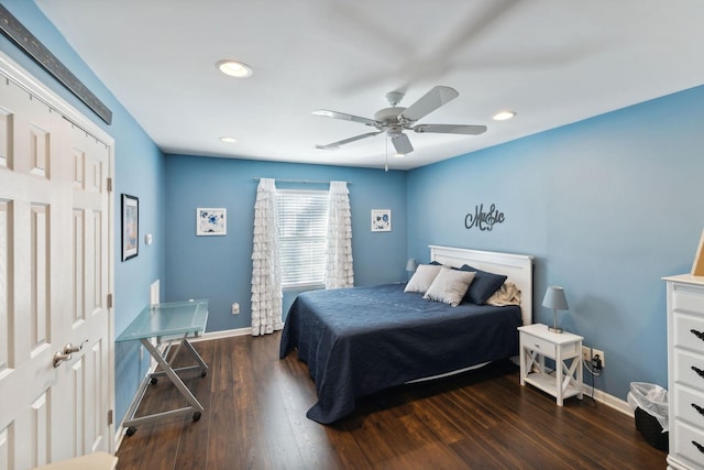 bedroom featuring ceiling fan and dark hardwood / wood-style flooring