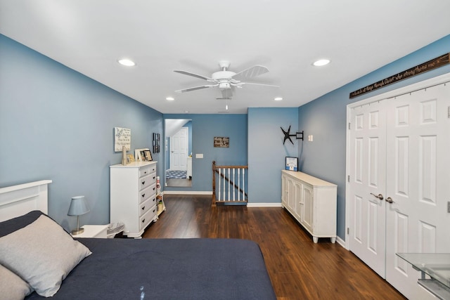 bedroom with ceiling fan, dark hardwood / wood-style flooring, and a closet