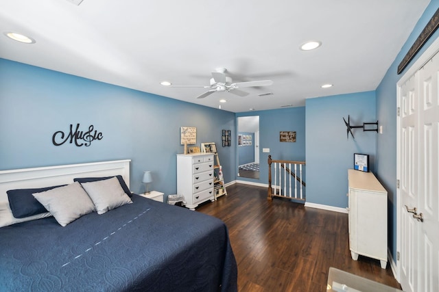 bedroom featuring dark wood-type flooring and ceiling fan