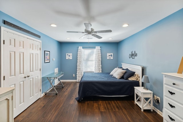 bedroom featuring ceiling fan and dark hardwood / wood-style flooring