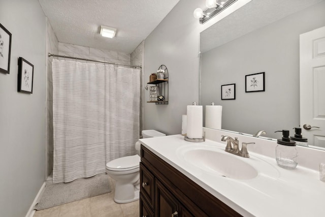 bathroom with tile patterned floors, toilet, a textured ceiling, vanity, and a shower with shower curtain