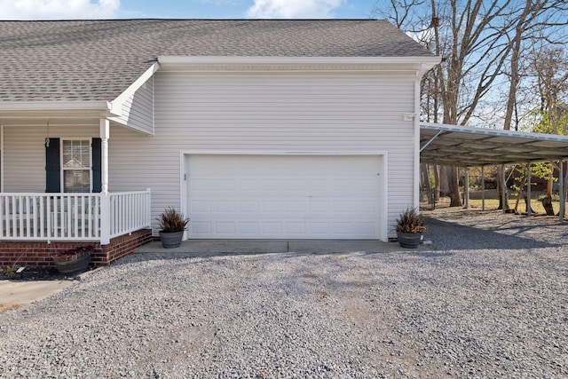 view of home's exterior with a garage, a carport, and a porch