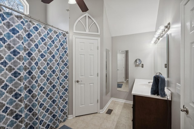 bathroom with vanity, lofted ceiling, and ceiling fan