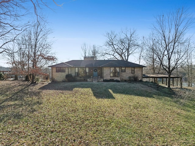 view of front of property with a front lawn